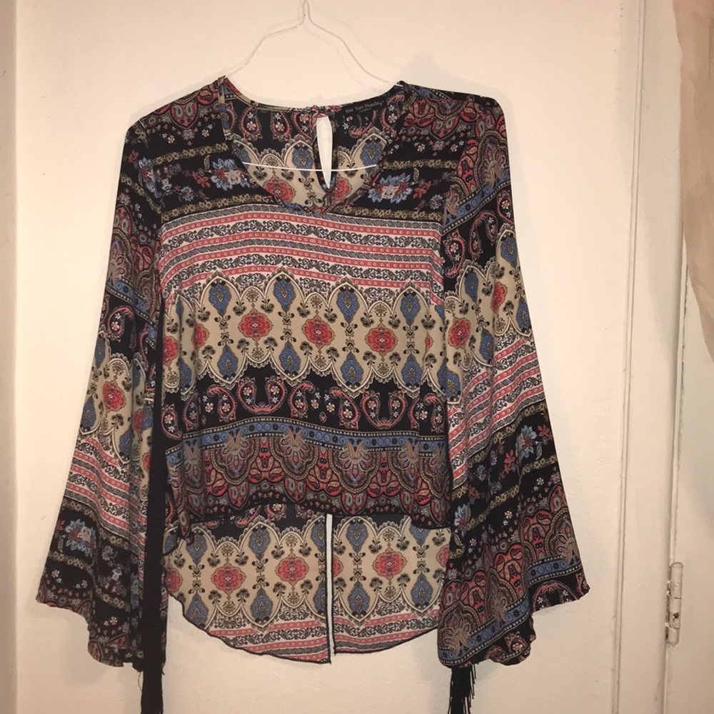 Funky wide sleeved fringe blouse